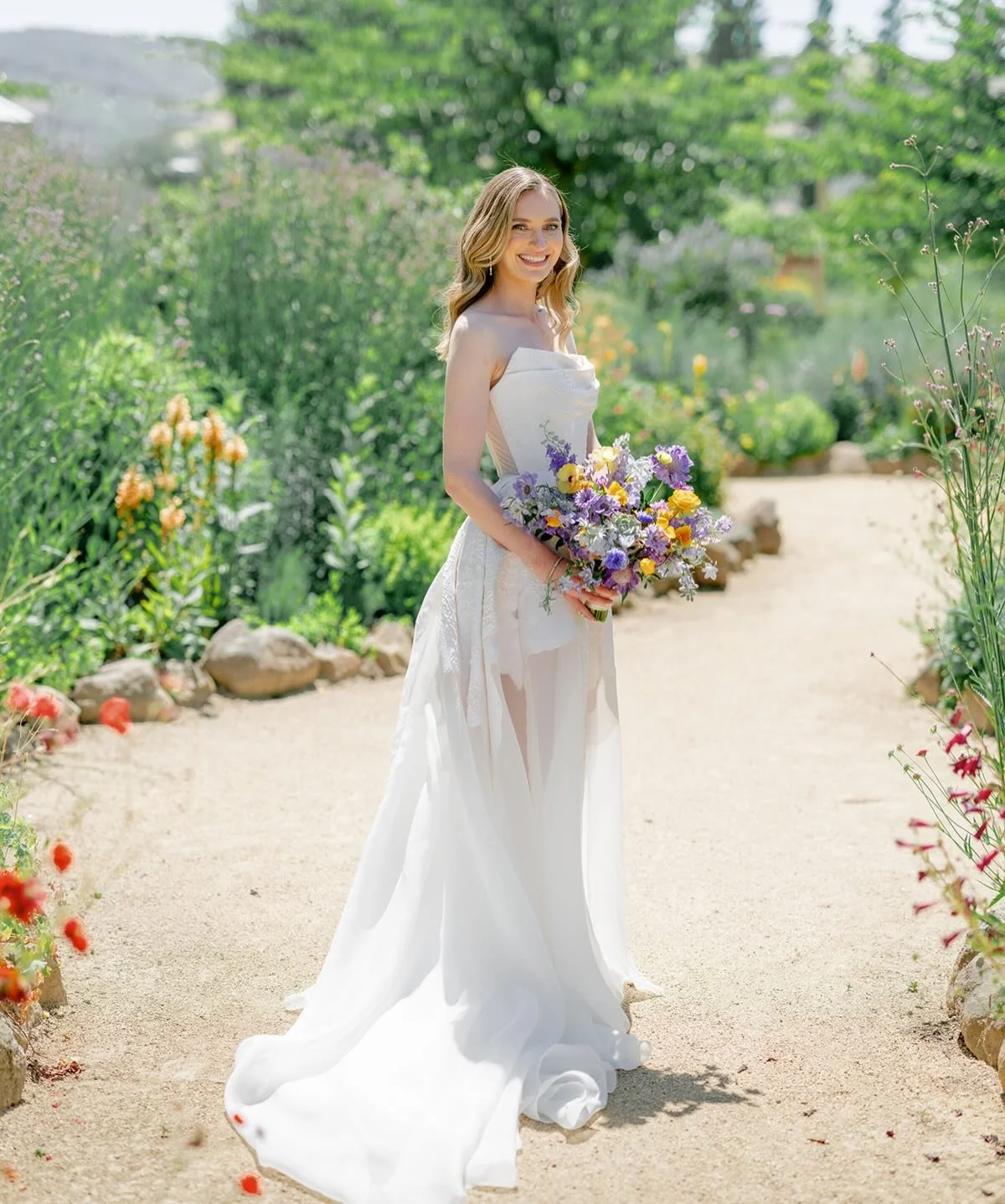 Garden dreams come to life. 
@adrimackenzie 🌿🪻
.
.
.
Venue @cornerstonesonoma 
Photos @thedejaureguis 
Floral design @bellevuefloralco 
Hair and makeup @bellabridalnv 
Rentals @encoreeventsrentals 
Rentals @theonicollection 
DJ @djvonwoo 

Photos @