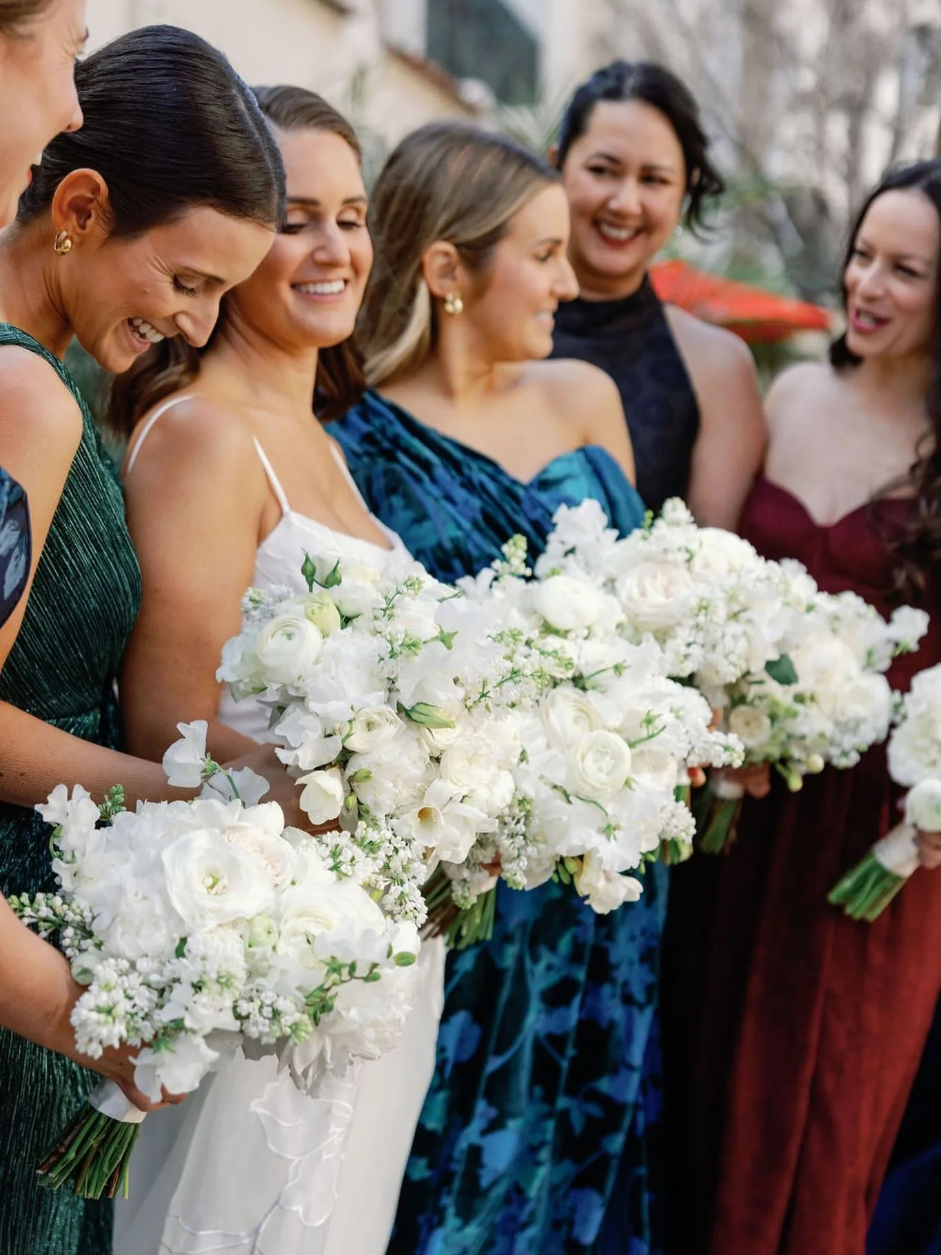 White florals and jewel tones for Allyson&rsquo;s ladies. 
A joyful day indeed! 
.
.
.
Photos @adrianaklas 
Venue @roundhillcc 
Floral @annemendenhallflowers 
Hair @jmb_hair 
Makeup @mu_by_adele 
@allysonjo 🤍