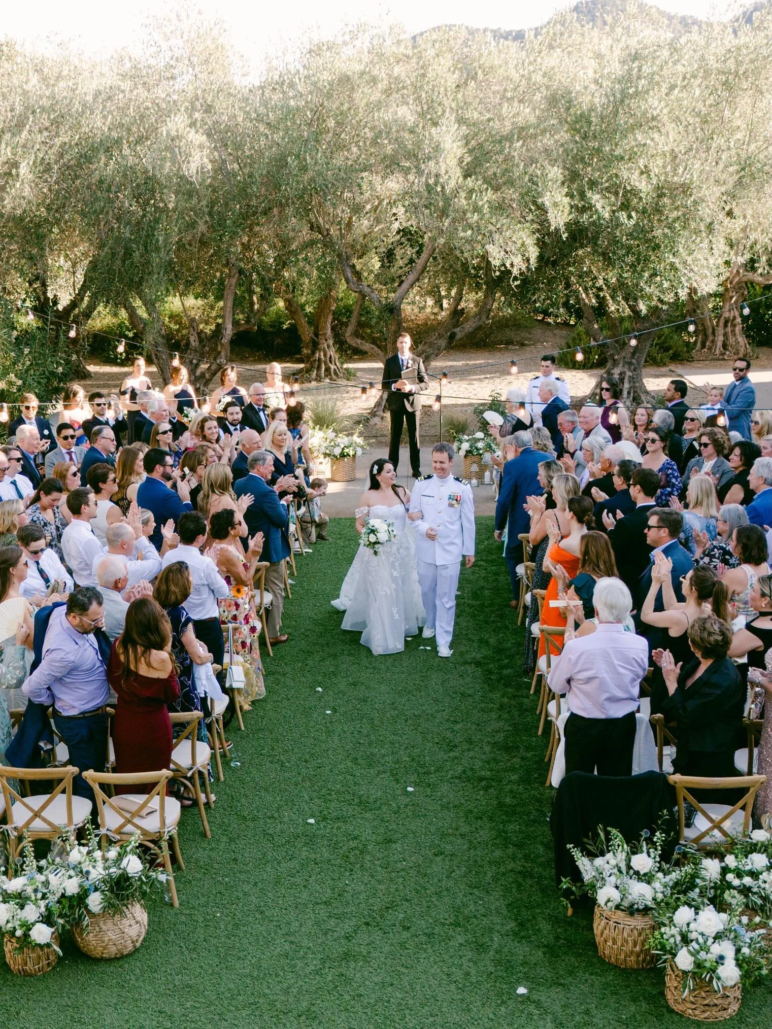 One of my favorite moments from Lauren and Keith&rsquo;s wedding was when Keith surprised Lauren (and her Dad!) by secretly changing into his Navy whites! Their reaction down the aisle was priceless! 
Such a gorgeous and joyful day. 
.
.
.
Venue @the