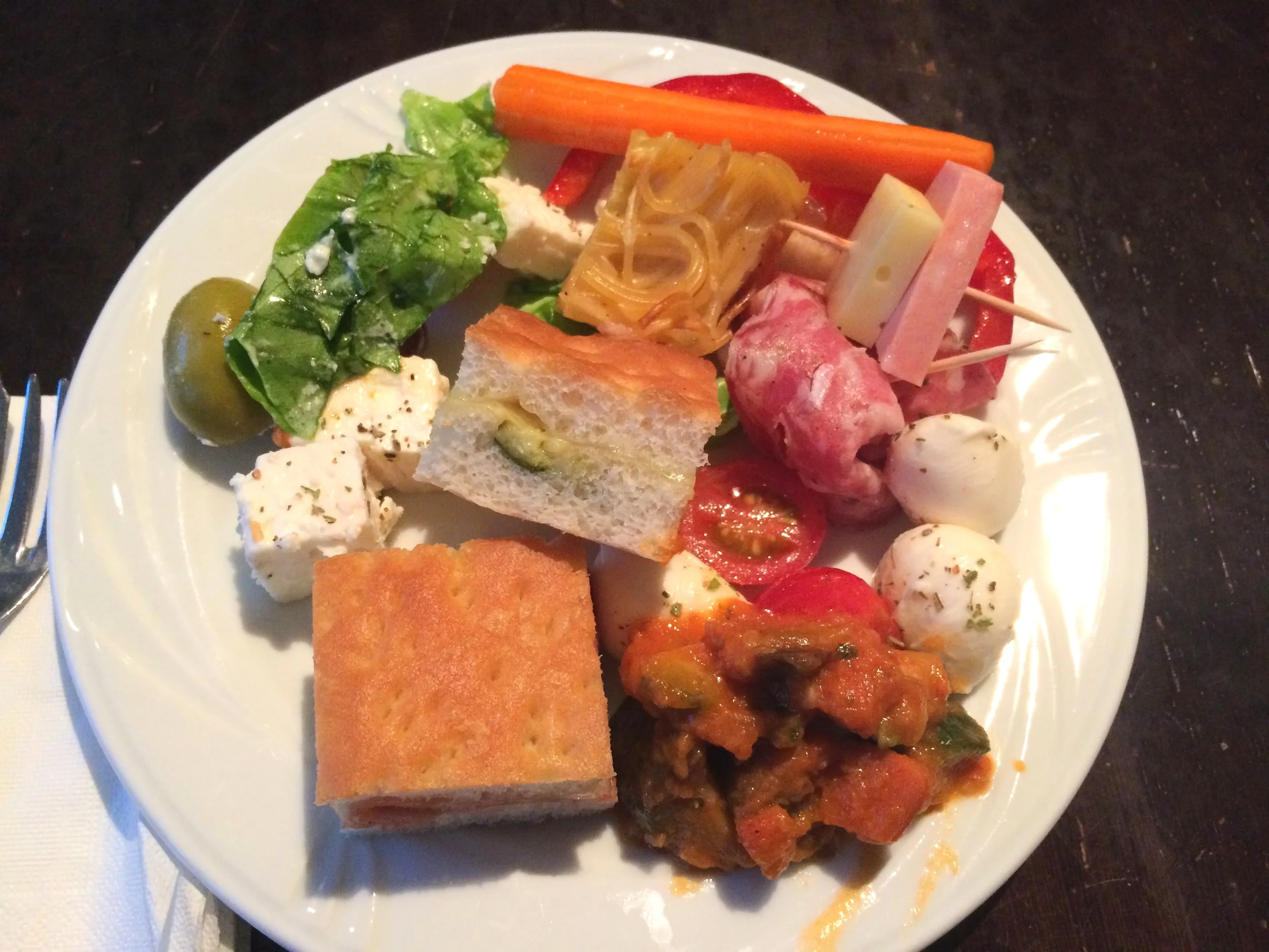 Plate of random food from buffet at O Bar