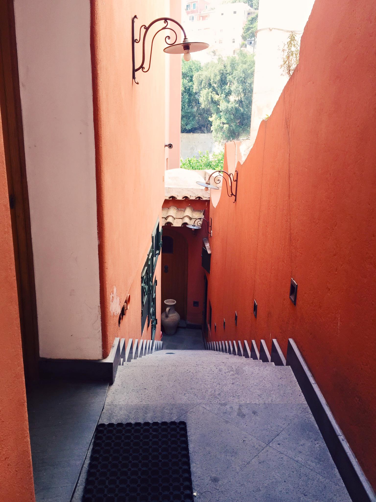 Coral-colored stairwell in Positano