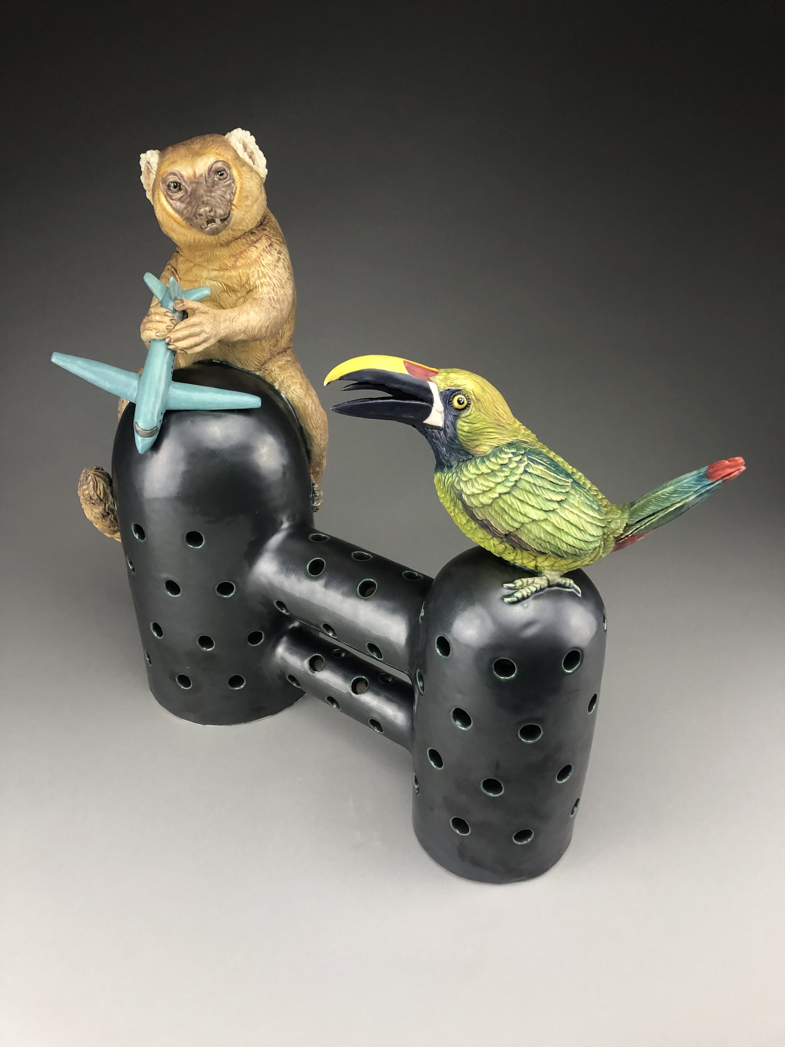 Topsy Turvy (King kong golden lemur with plane and Emerald toucanet)
