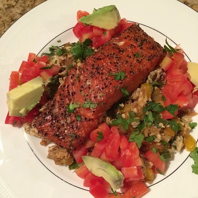Smoked salmon can be bought whole and already done and ready to eat! Just put it over your favorite veggie or dish! Here I have it over an egg scramble for a great brunch!