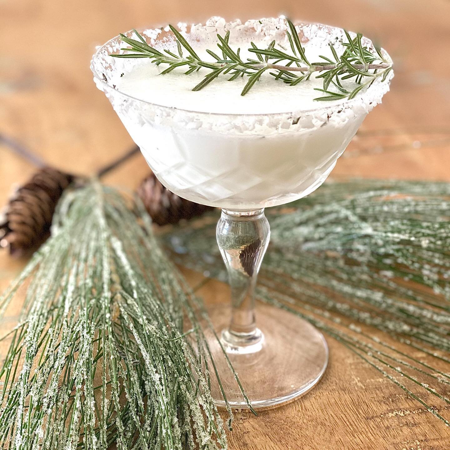 Snowy Pines Cocktail &bull; I&rsquo;ve full-on switched to Christmas mode. I guess the entire month of November was long enough to mourn Halloween - haha! This is the perfect cocktail to sip fireside throughout the month of December. The rosemary sim
