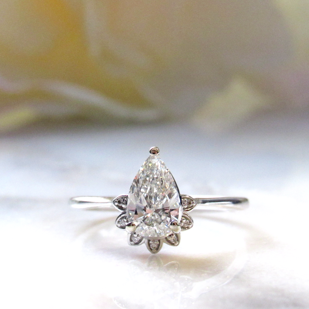 Pear Diamond Engagement Ring with Half Halo