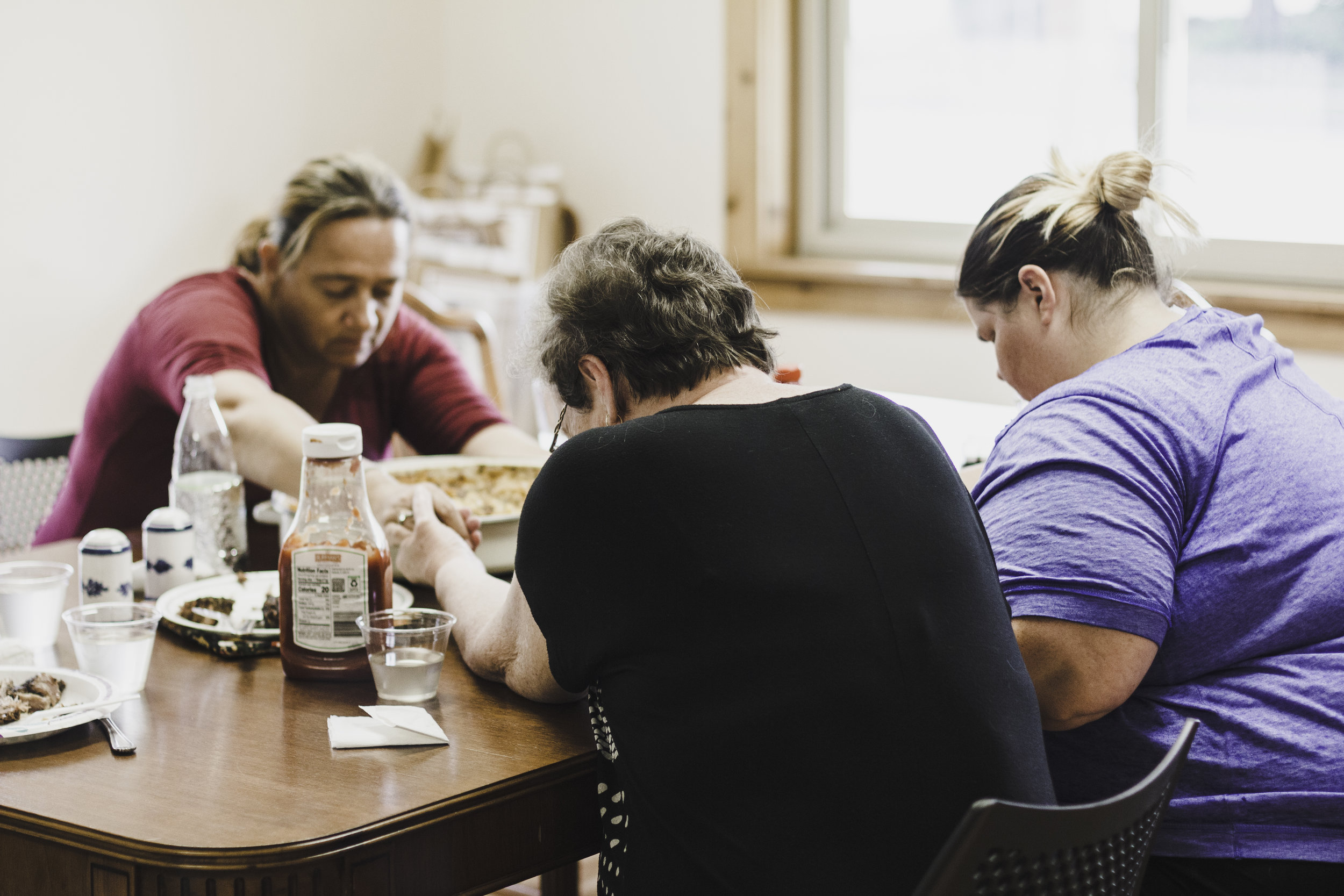 next-chapter-ministries-womens-study-lunch-praying.jpg