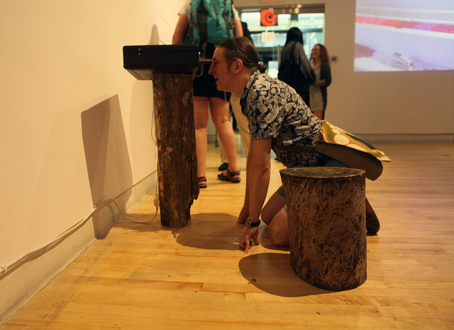 You might look into a briefcase, see a lumberjack chopping wood, and then realize that you’ve been transformed into a log. (Nick Bertozzi)