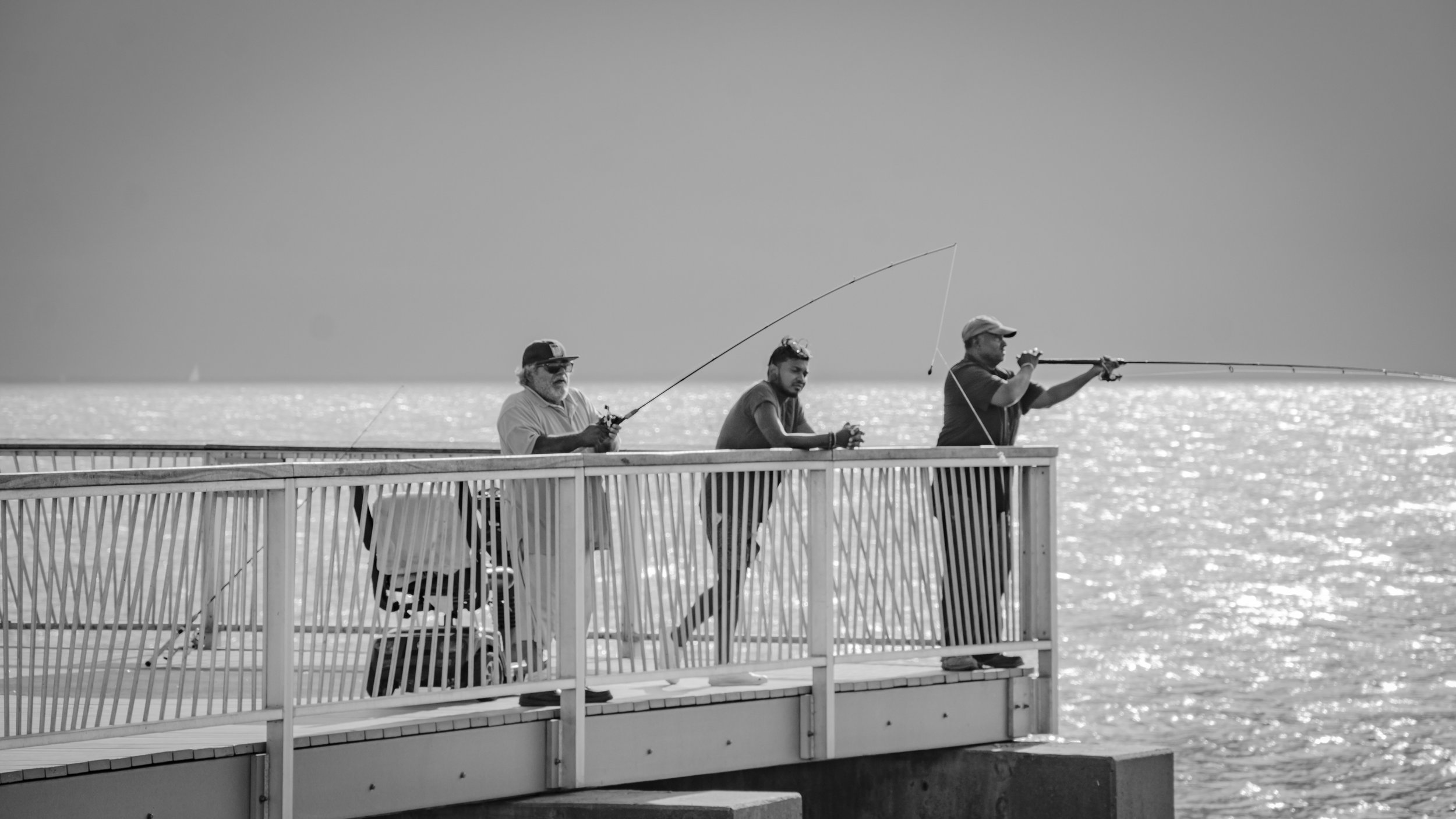 fishers on pier v3 b-w.jpg