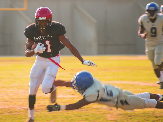 Cameron Coleman runs the ball at Grigby Field during the scrimage against SBVC. Photo by Michael Ravenelle.