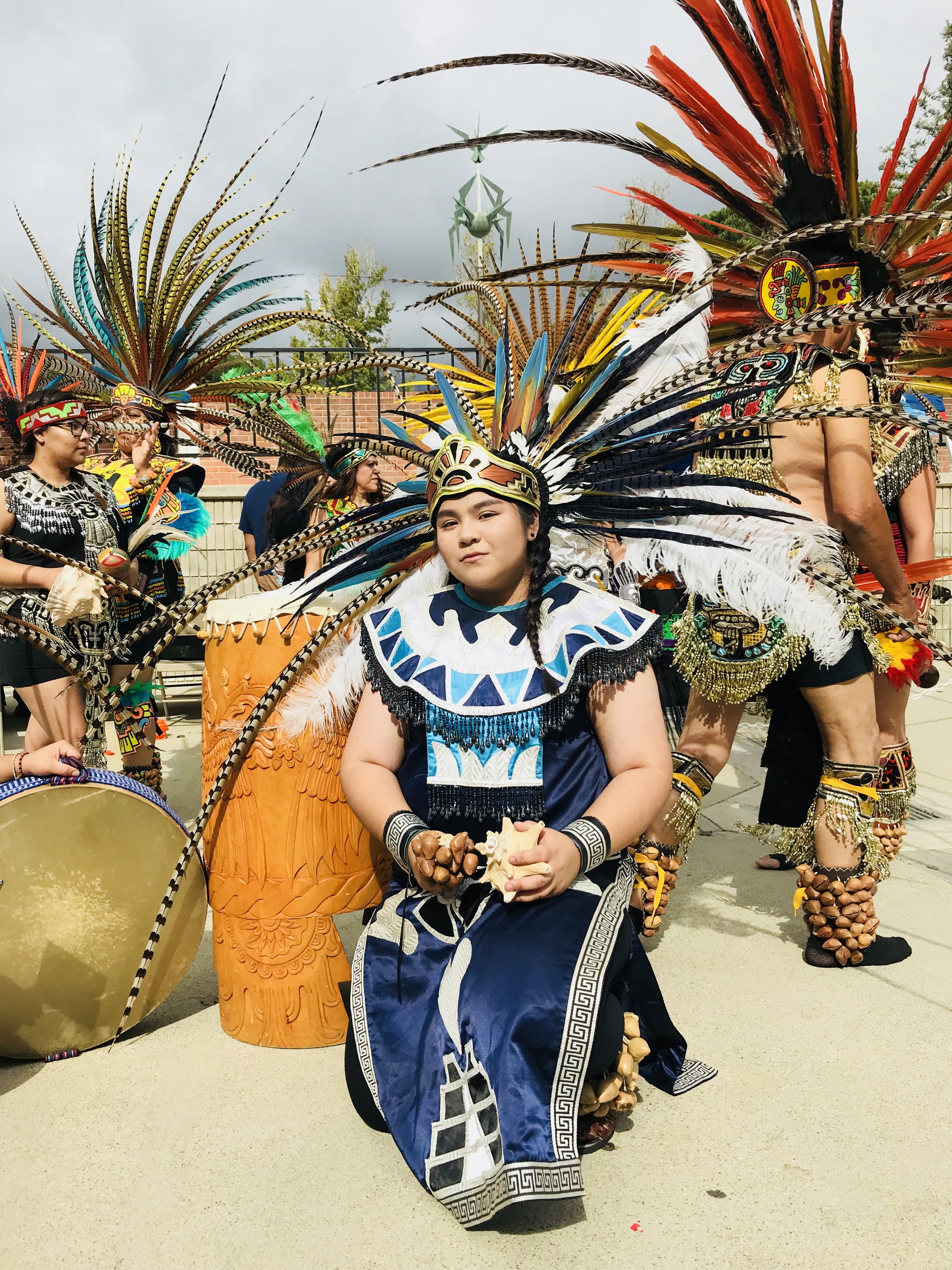  Jaqueline Rivas, a Danzantes del Sol dancer, poses in traditional Mihtotiquetl clothing on Thursday, Nov. 2 in the CCE of the Rancho Cucamonga Campus. The dance group Danzantes Del Sol helped Chaffey College celebrate Dia De Los Muertos. Photo by Do