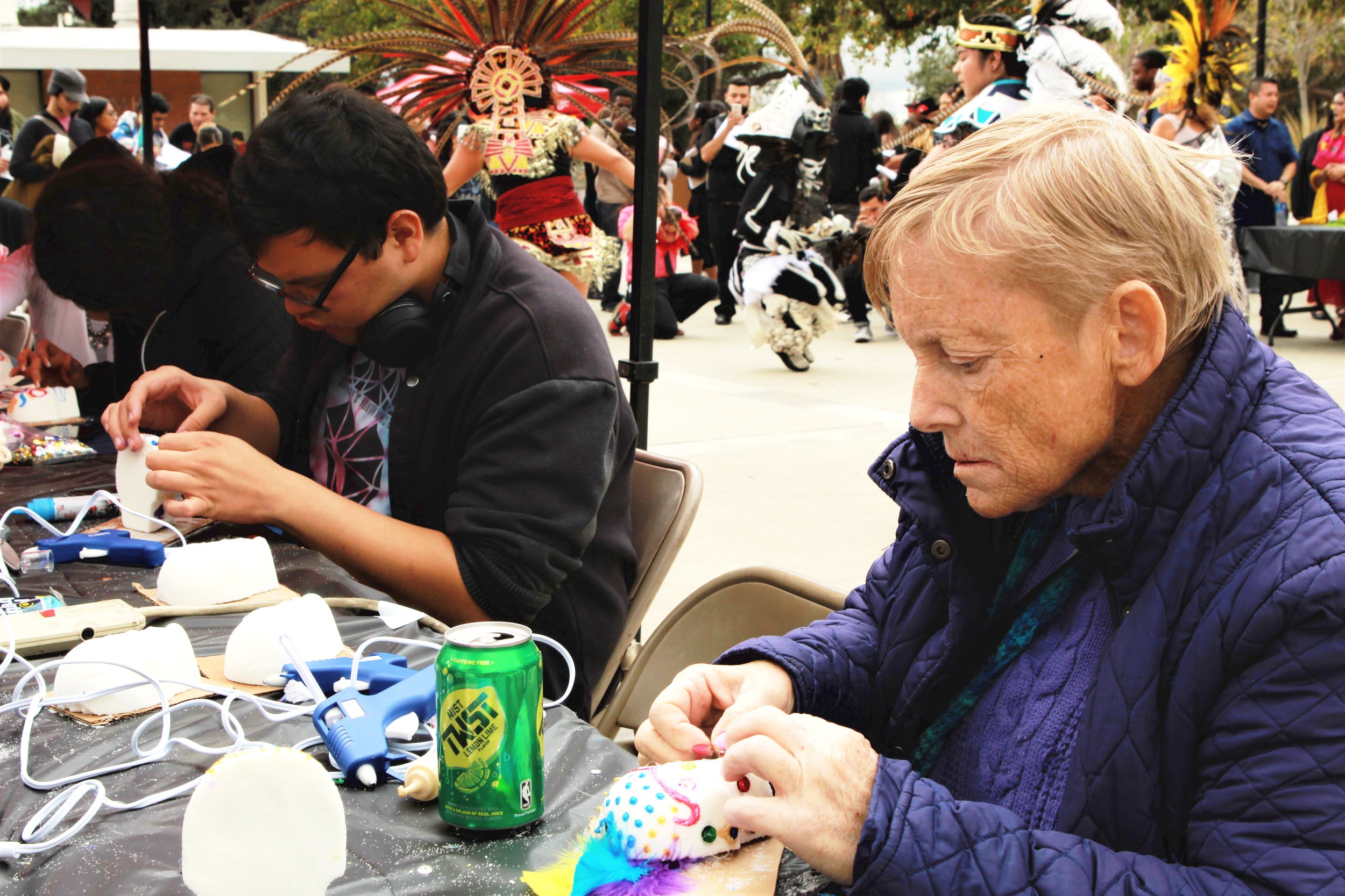  Debroh Dailey, a student of Chaffey College's Child Development Program, decorates her own sugar candy skull as part of the Day of the Dead festivities on Nov. 2, 2017. Photograph by Joshua Gutierrez. 