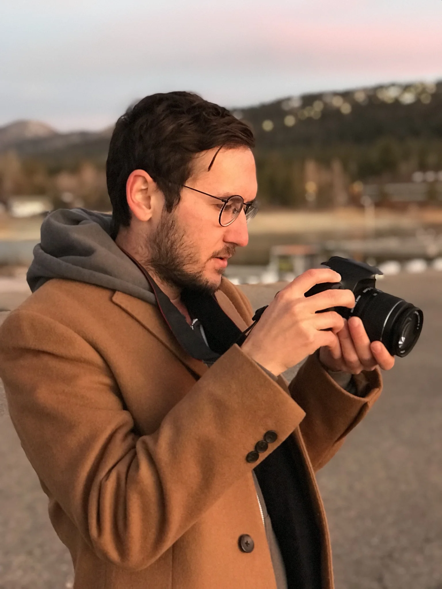 Accounting student Eli Bokori enjoying one of his passions, photography. Photo by Kris Tashjian
