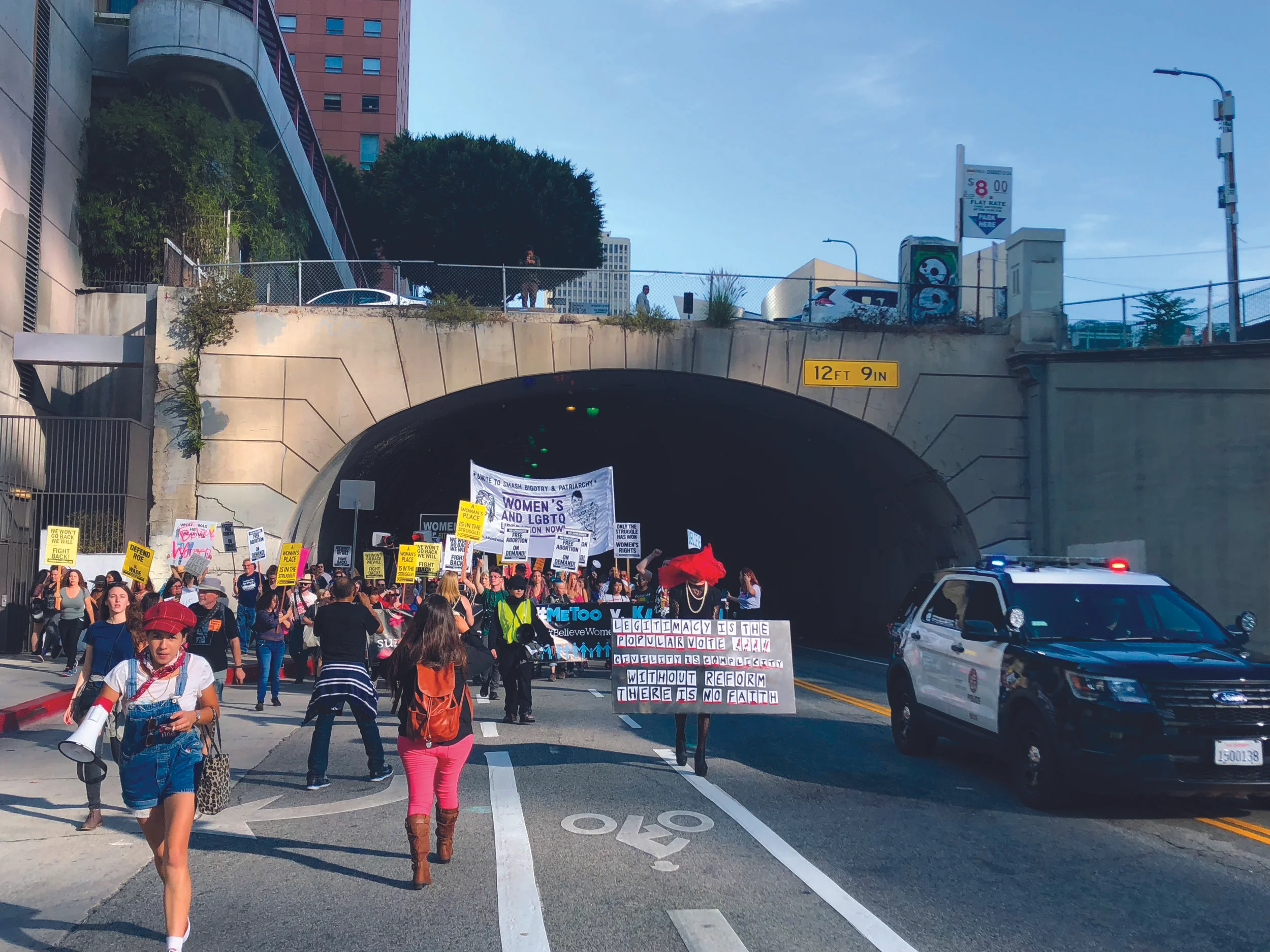 Protesters marching out of tunnel in DTLA