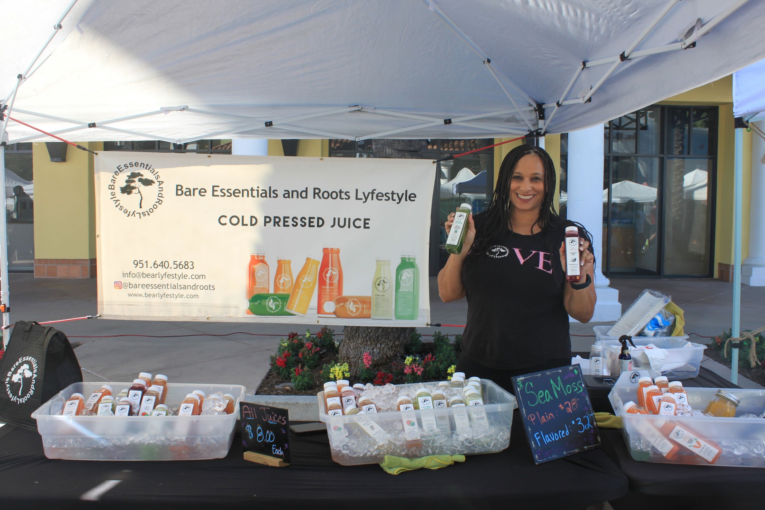  The entrepreneur behind Bare Essentials and Roots Lyfestyle COLD PRESSED JUICE strikes a confident pose, showcasing her products with pride, a snapshot of dedication to wellness and natural goodness. Photo by Jess Rodrigo 
