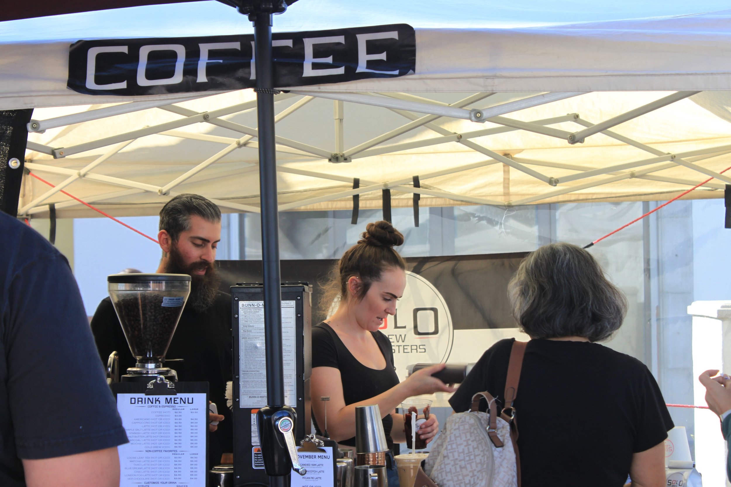  At the market debut, the coffee stand takes center stage, captivating all with the aroma of freshly brewed goodness, inviting everyone to savor the moment with a cup of perfection. Photo by Jess Rodrigo 