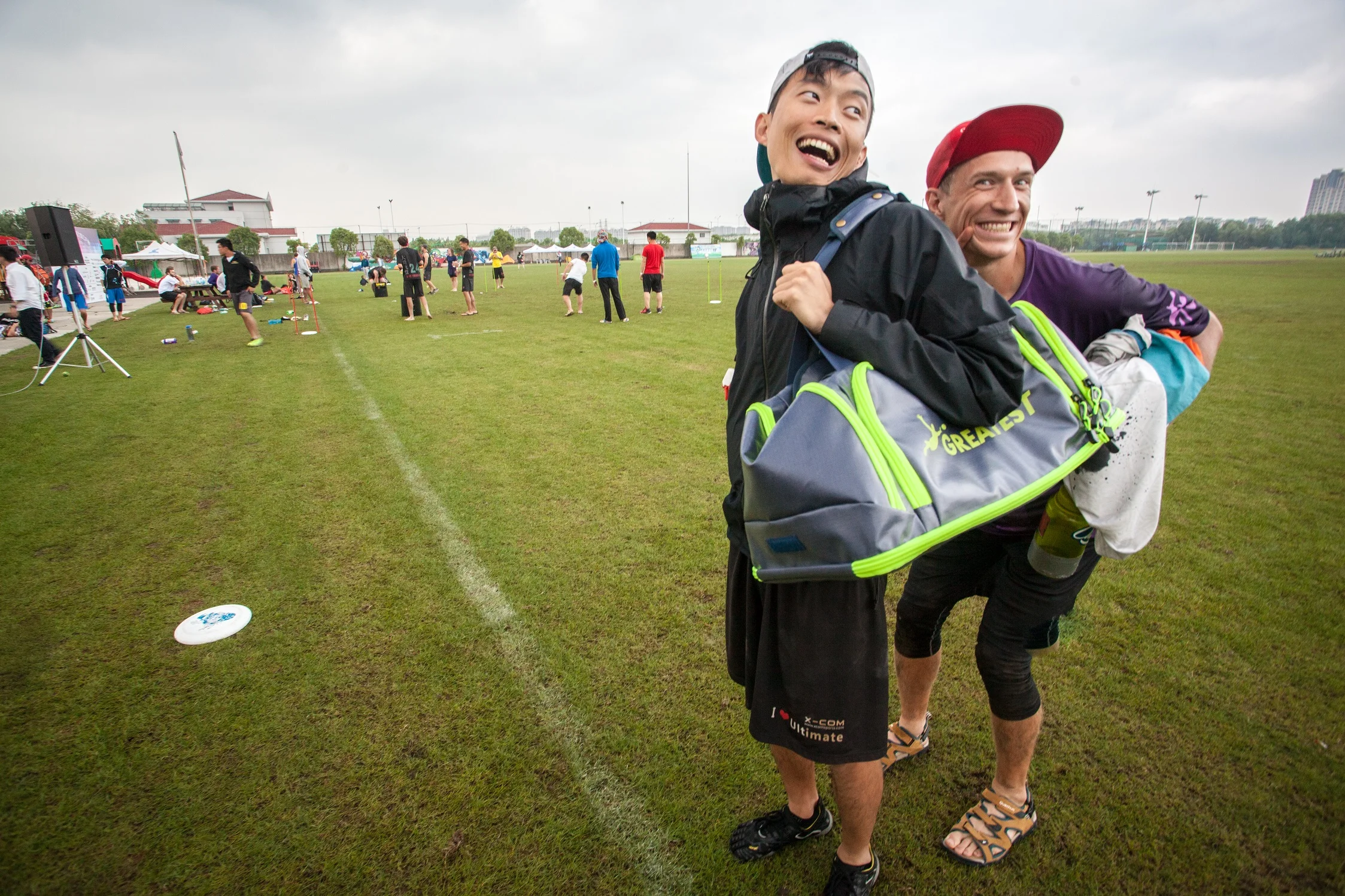 Vince Cong and Yuri Melnychuk modeling a Greatest Bag