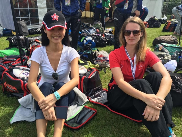 The girls found a novel use for the backpack straps cover - a water resistant seat for those damp London fields