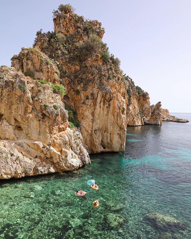 Floating on the crystal clear, turquoise sea. Summer doesn&rsquo;t get any better than this in Sicily. #mappingsicily #worldoceansday #italysegreta #italy