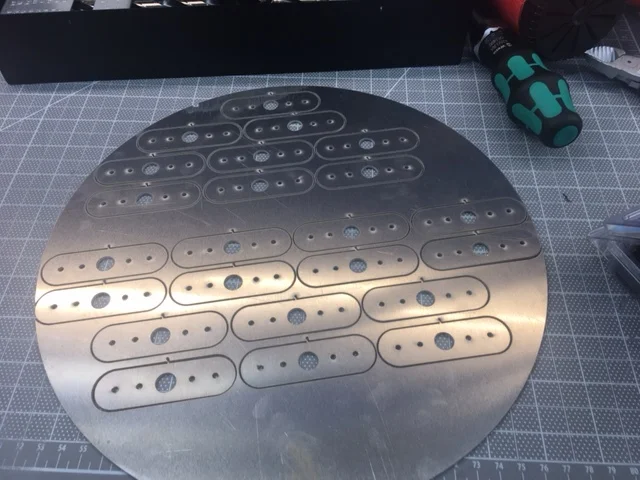 Mounting plates cut from the fan cutout scrap