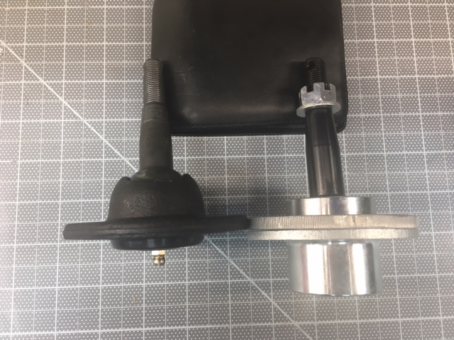 Stock ball joint on the left and QA1 ball joint on the right