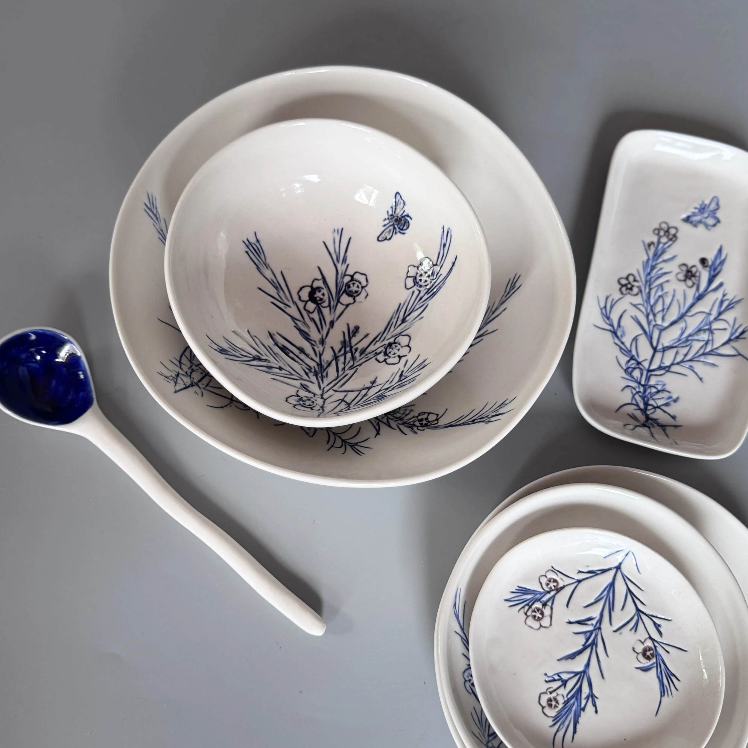 plates and bowls with grevillea designs