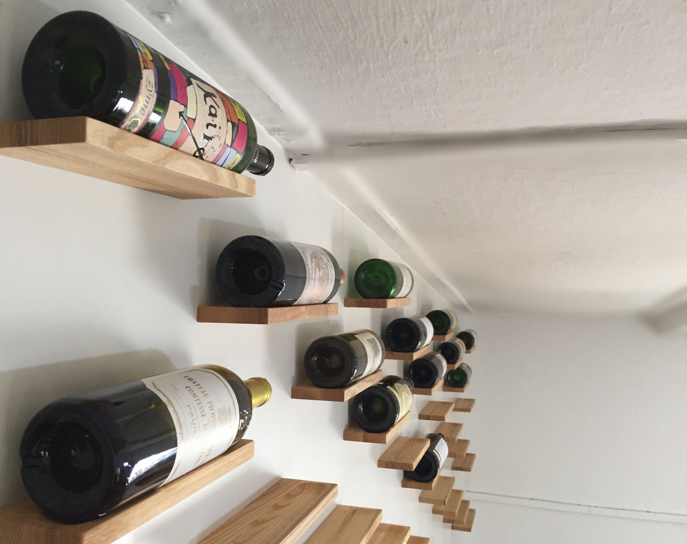 Each holder is moulded to give a snug fit to the curve of the wine bottles.