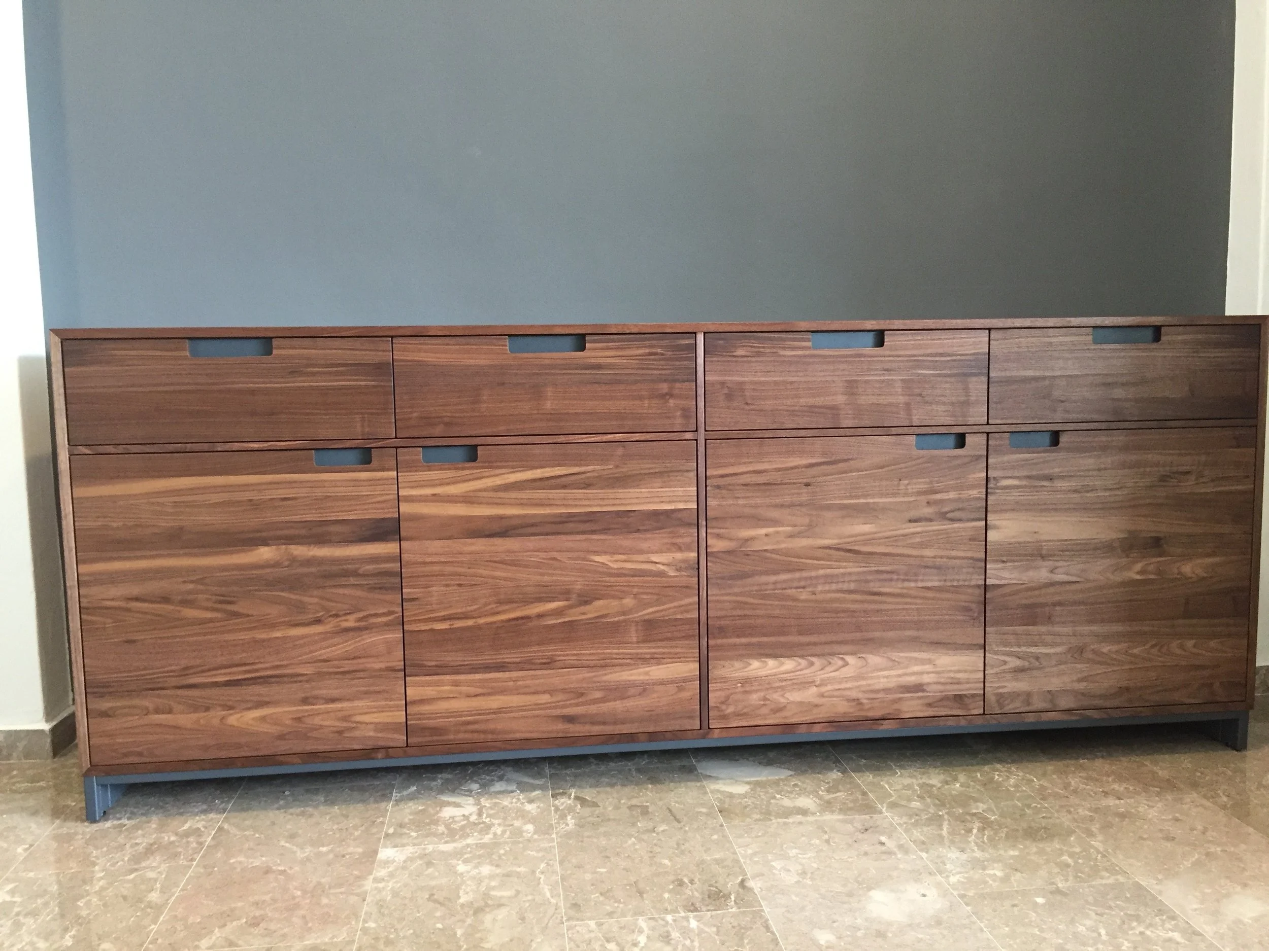 With such a long facade, the trickiest part was to ensure that the wood grains flow nicely taking advantage of the distinctive grains of each plank of timber.