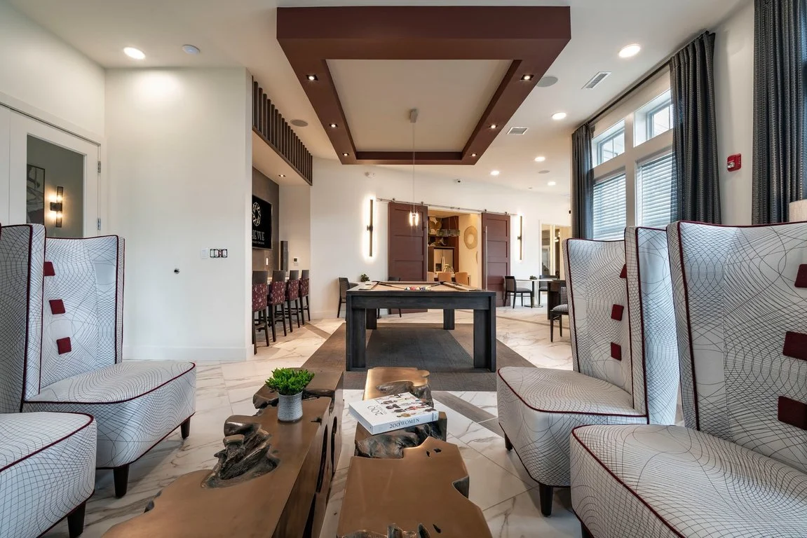 The Vue at Maynard Crossing - Game Lounge with Pool Table and Couches - Forum Architecture.jpg