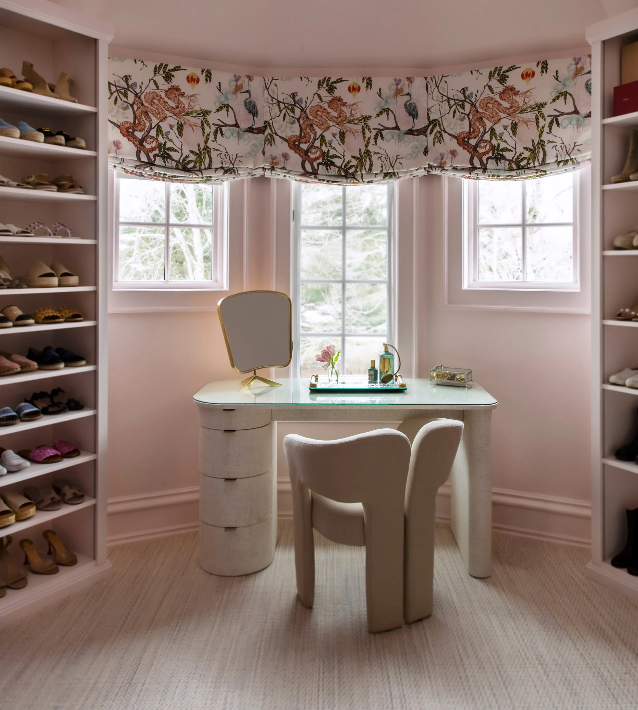 When designing this walk-in closet, the goal was to maximize natural light without sacrificing high-end storage. We placed a vanity directly within the curved window, creating a sun-drenched sanctuary for morning routines.

@artwilliecole @modernmatt