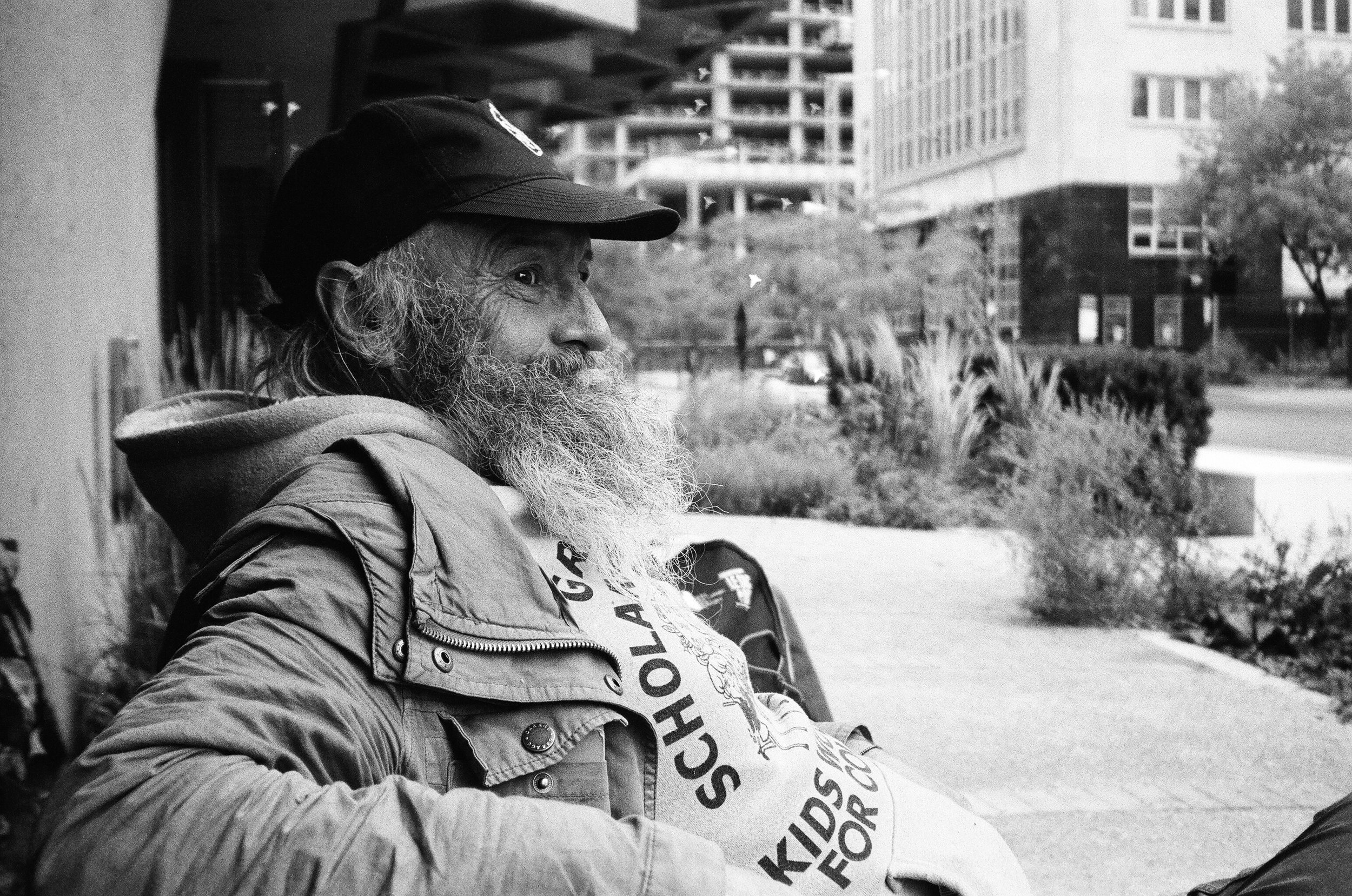 Man on bench holding court