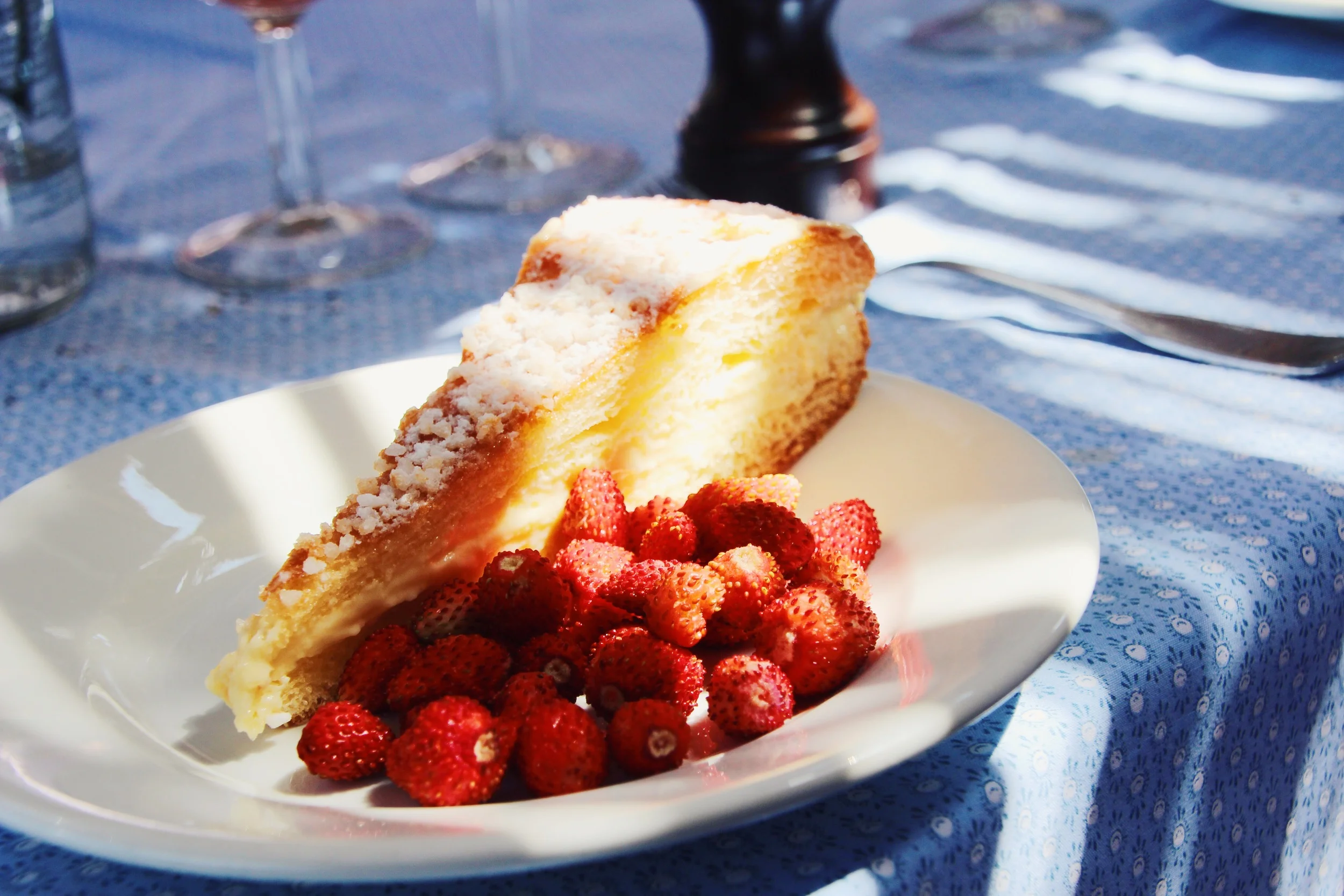 Delicious vanilla layered cake. Mini strawberries on the side!