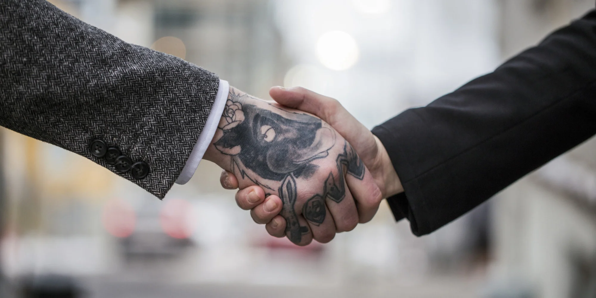 o-HANDSHAKE-TATTOO-facebook.jpg