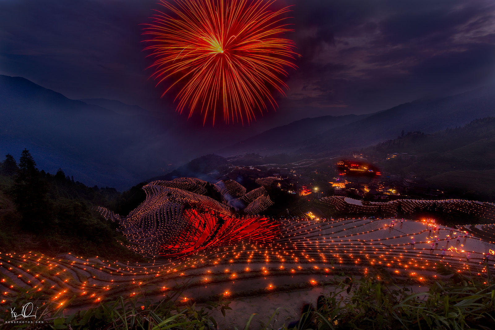   GUILIN CHINA. &nbsp;FIREWORKS AND CANDLES LIGHT UP RICE TERRACES.  
