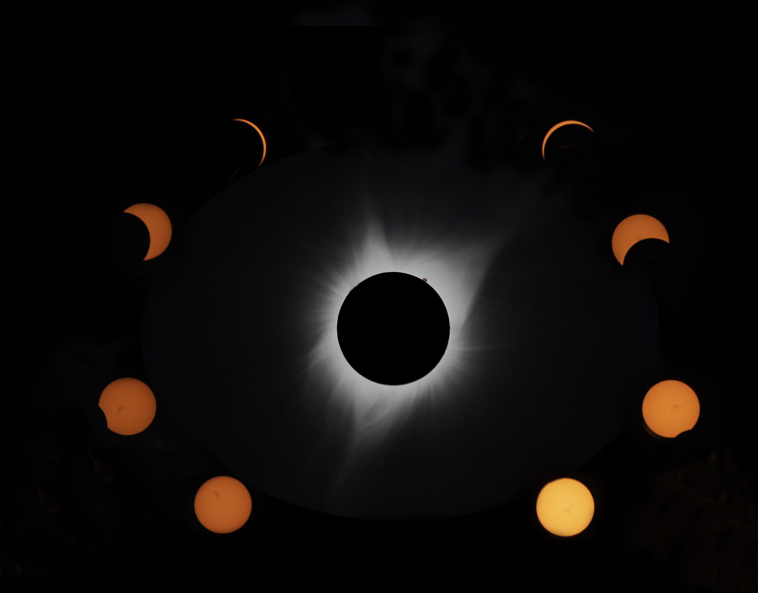   TIME LAPSE OF AUGUST SOLAR ECLIPSE. &nbsp;I PROCESSED THIS PHOTO AND TOOK THE PHOTO IN THE CENTER.&nbsp;THE VARIOUS PHASES OF THE SUN AND MOON BEFORE AND AFTER TOTALITY WERE PHOTOGRAPHED BY MY GOOD FRIEND TONY SALVATORE.  