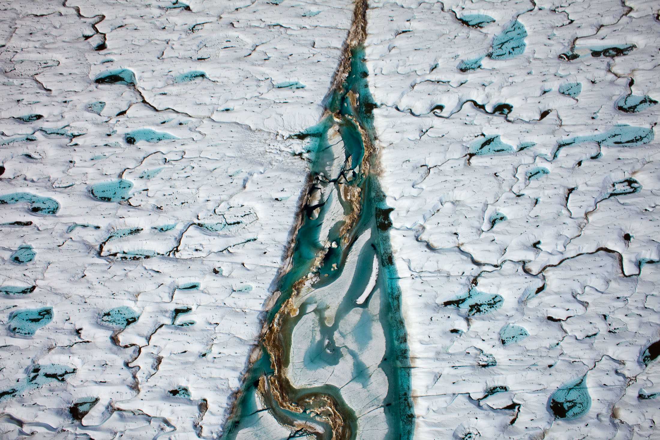 Crack in the surface of Petermann Glacier on Greenland's north west coast