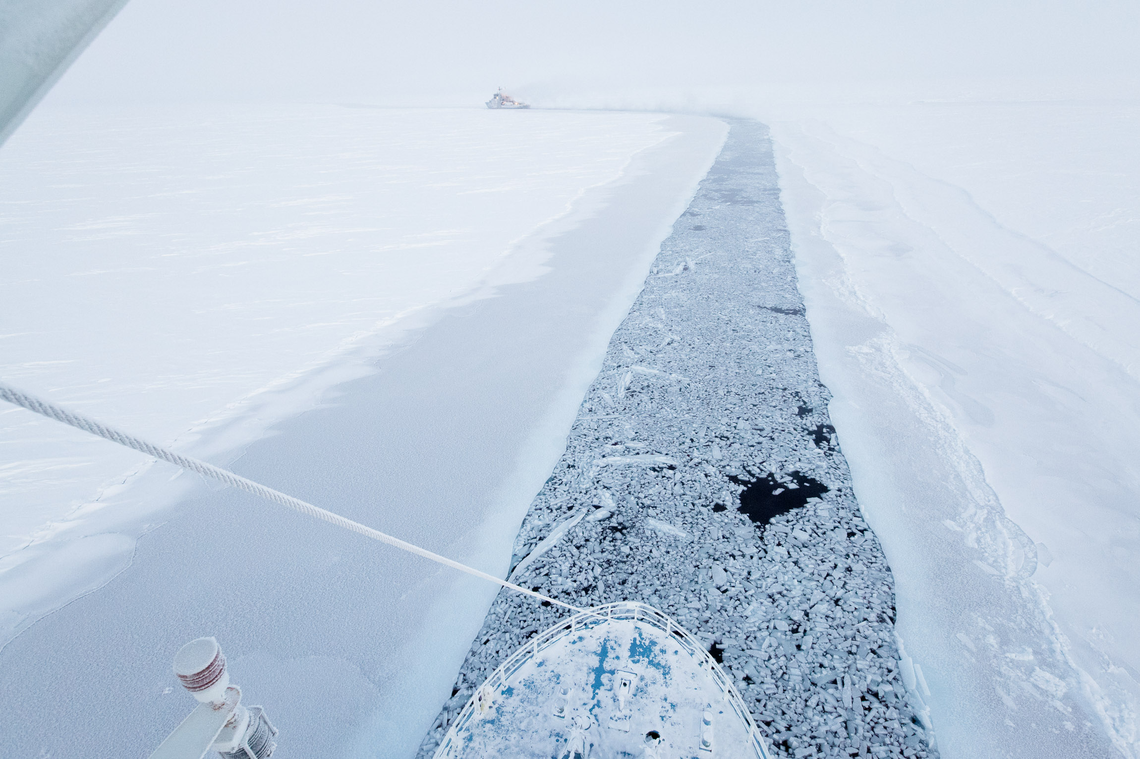 High up view a ship cutting through ice