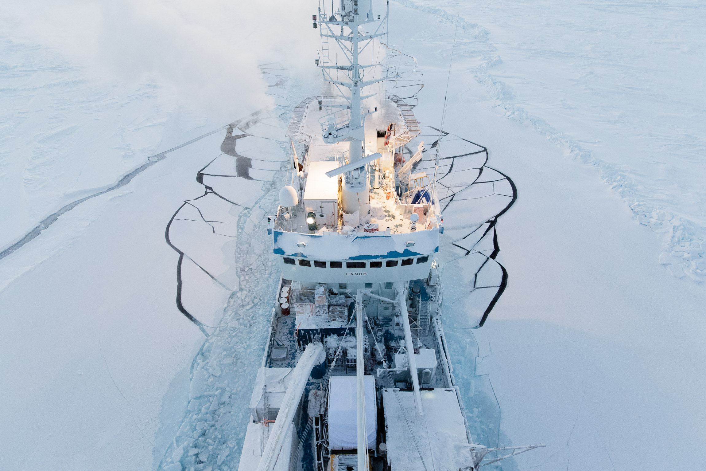 Research ship in cracked sea ice