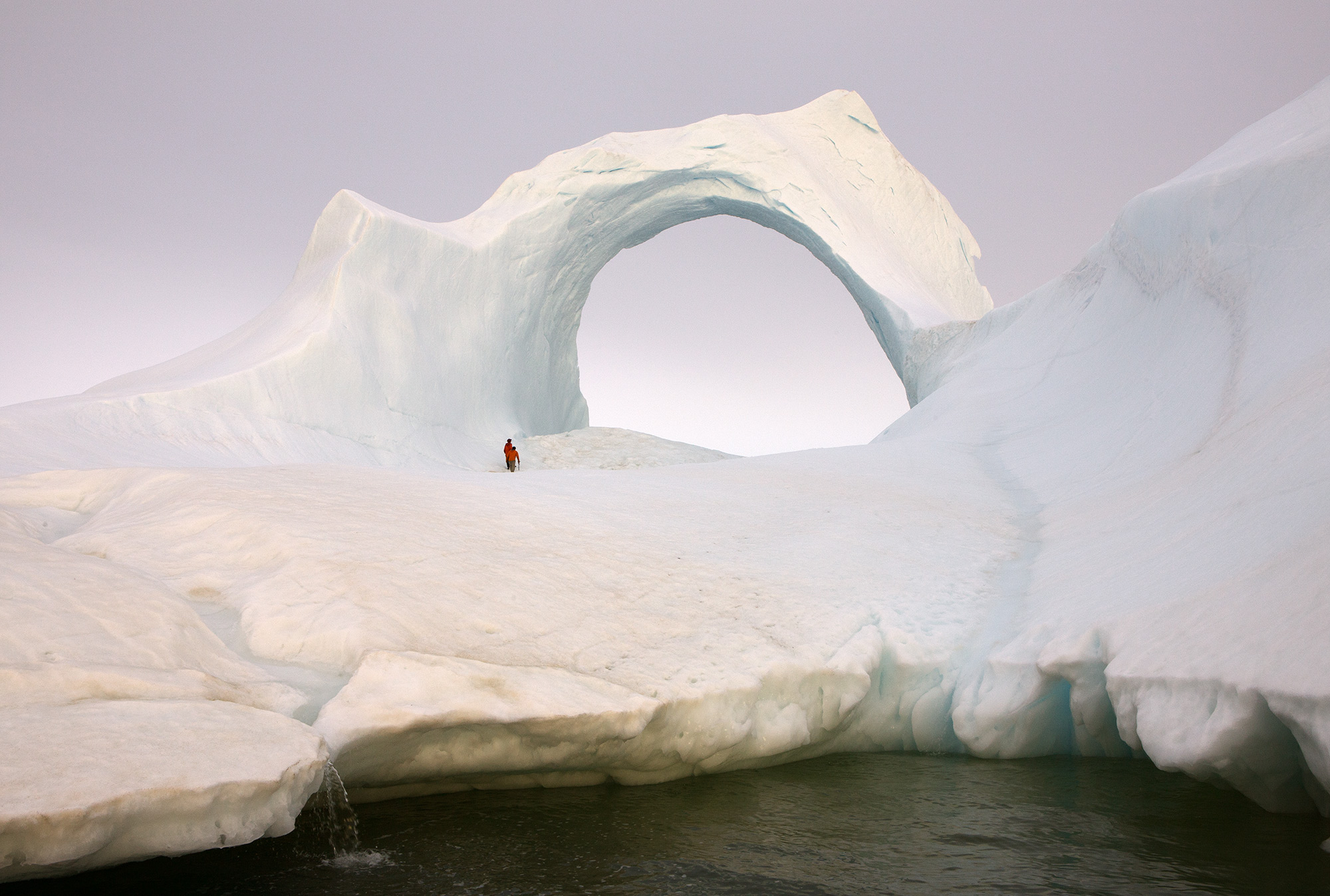Huge iceberg in the shape of an arch