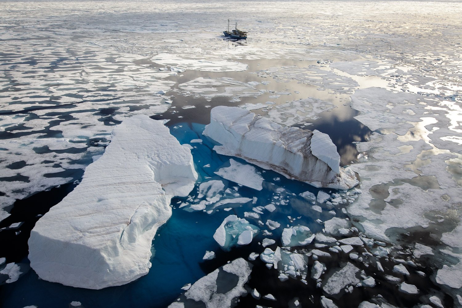 Small ship with large iceberg