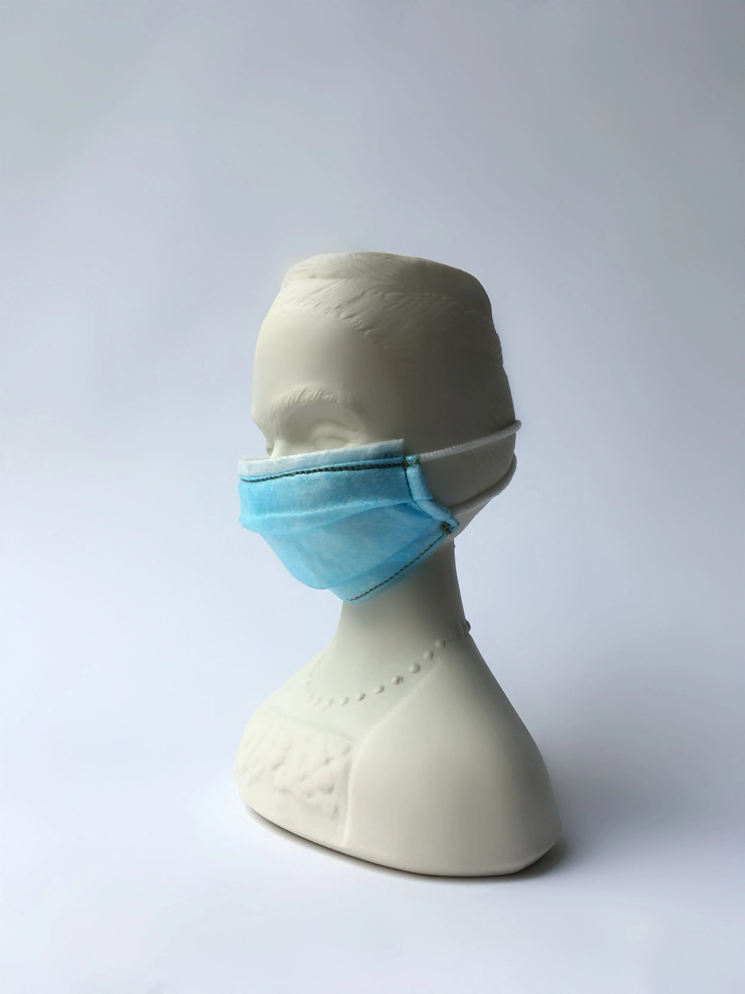 Studio Janneke Porcelain Frida vase with face mask.JPG