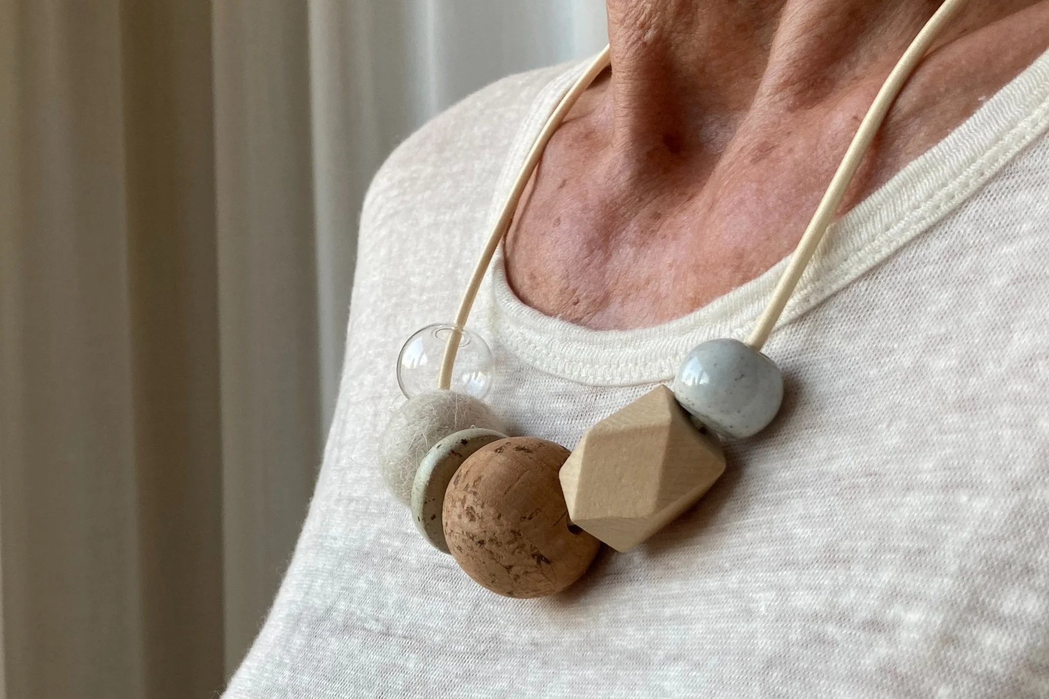 White Totem Necklace - Mixed Material Clay Cork Wood Felt Brass Glass Necklace - Ceramic Jewellery - Handmade Ceramics by Studio Janneke in London
