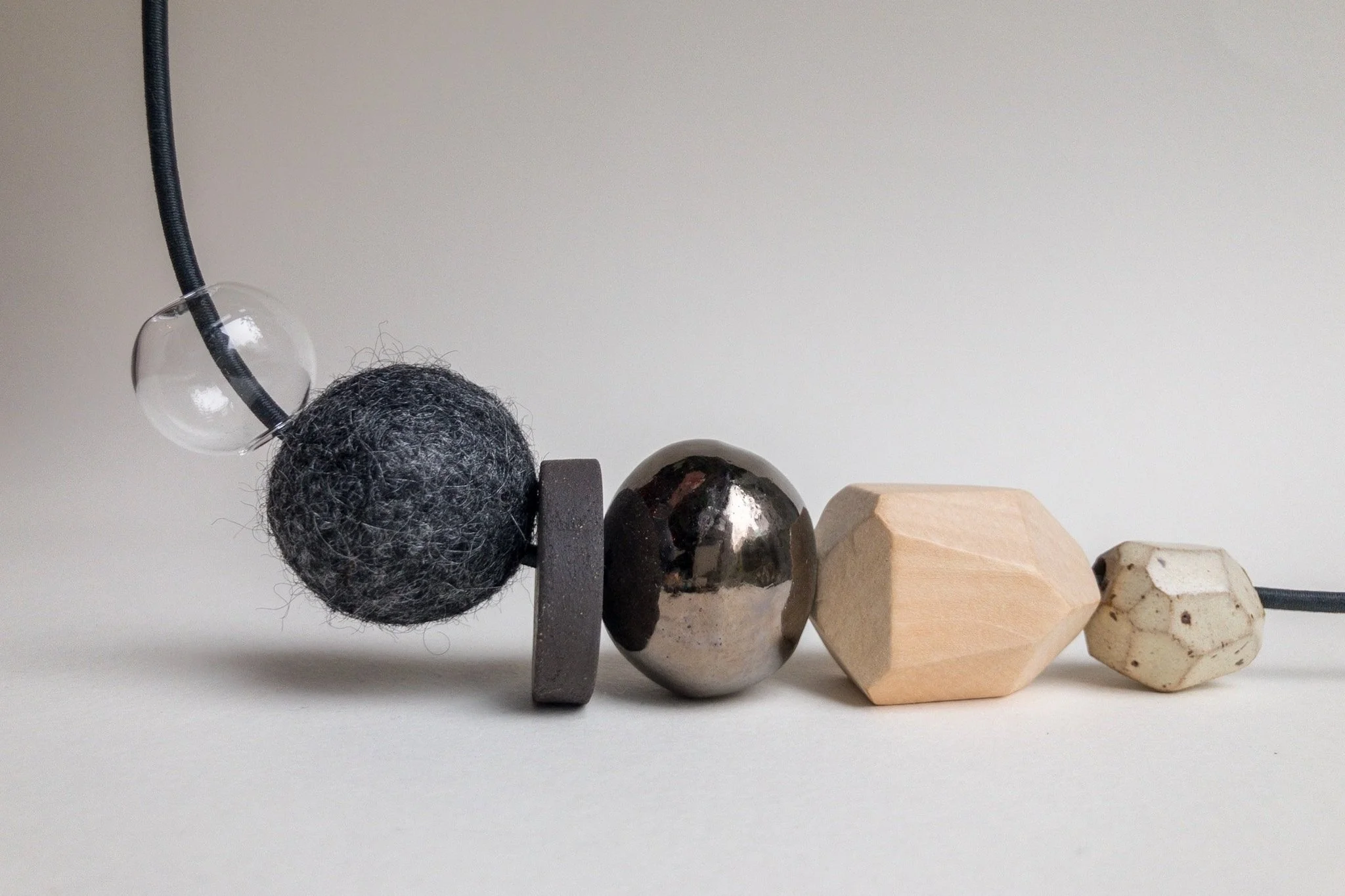 Black Totem Necklace - Mixed Material Clay Cork Wood Felt Brass Glass Necklace - Ceramic Jewellery - Handmade Ceramics by Studio Janneke in London