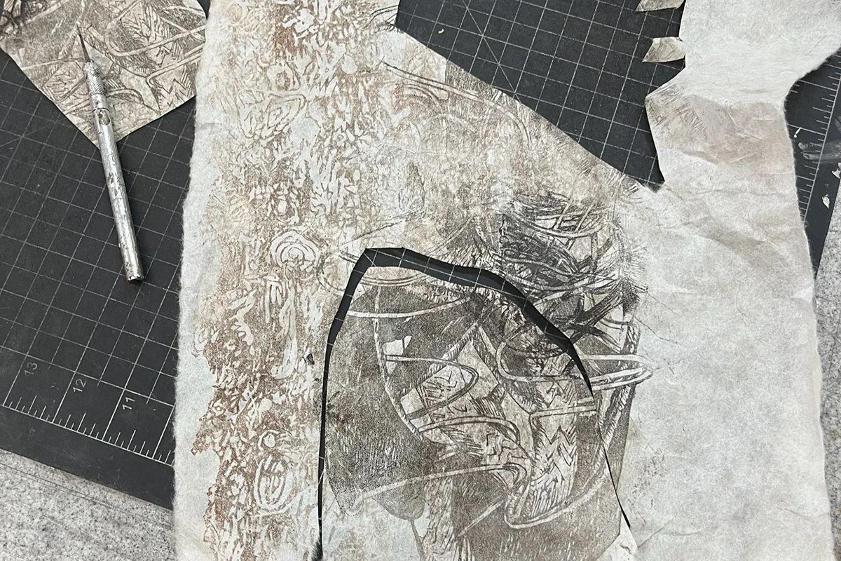 Two wood cuts are cut and joined together joining the lines in the prints