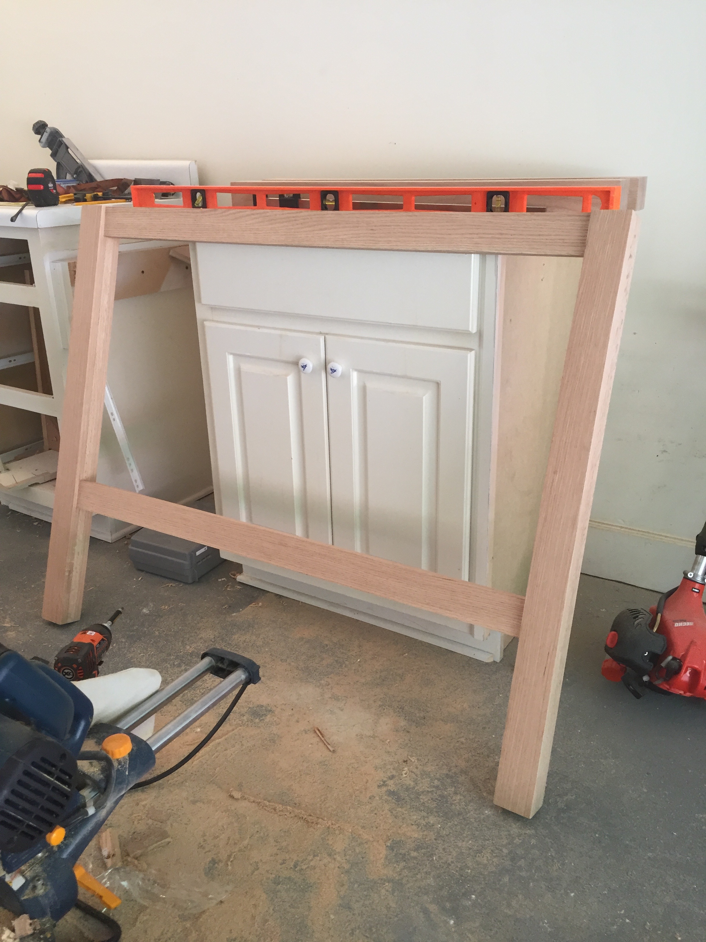 This is the start of the vanity. After looking through tons of vanity options, Charlie decided that building it himself was clearly the cheapest option, and the best way to get what we were looking for. So thankful he was up for the task:) 