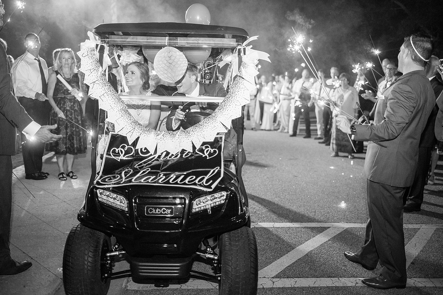 The funniest exit ever would probably be this one! They got in the golf cart, went to start it up....but the keys were nowhere to be found. They were good sports about it and totally just laughed it off while someone ran to find them!