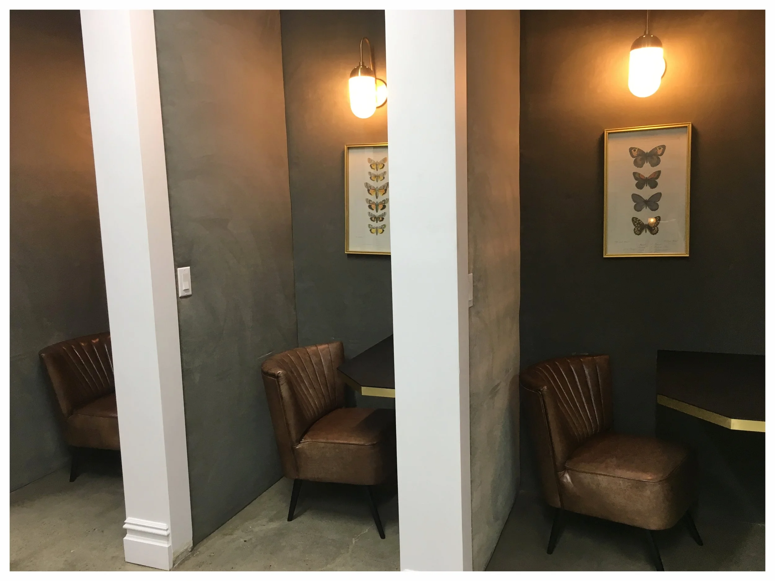 Fig 4A: Phone booths (glass doors to come) near the front desk.