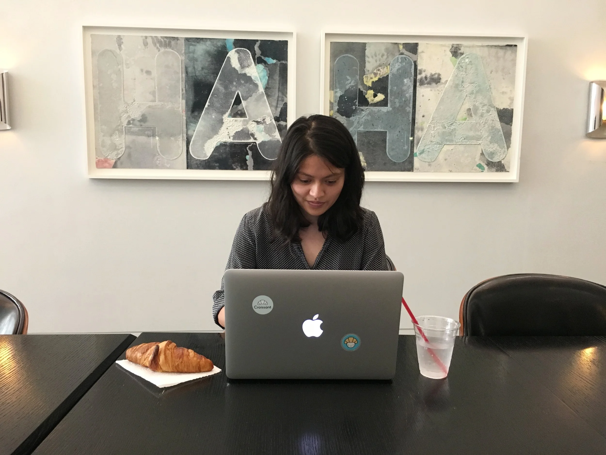 Fig 4A: That's me at the communal table, working hard, super focused, enjoying a trusty croissant :)