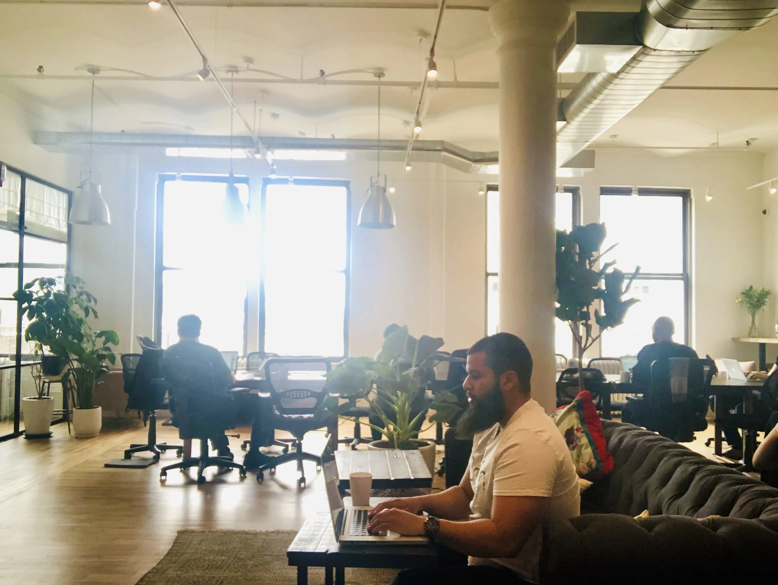 The moving company entrepreneur in his favorite coworking space, Village One.