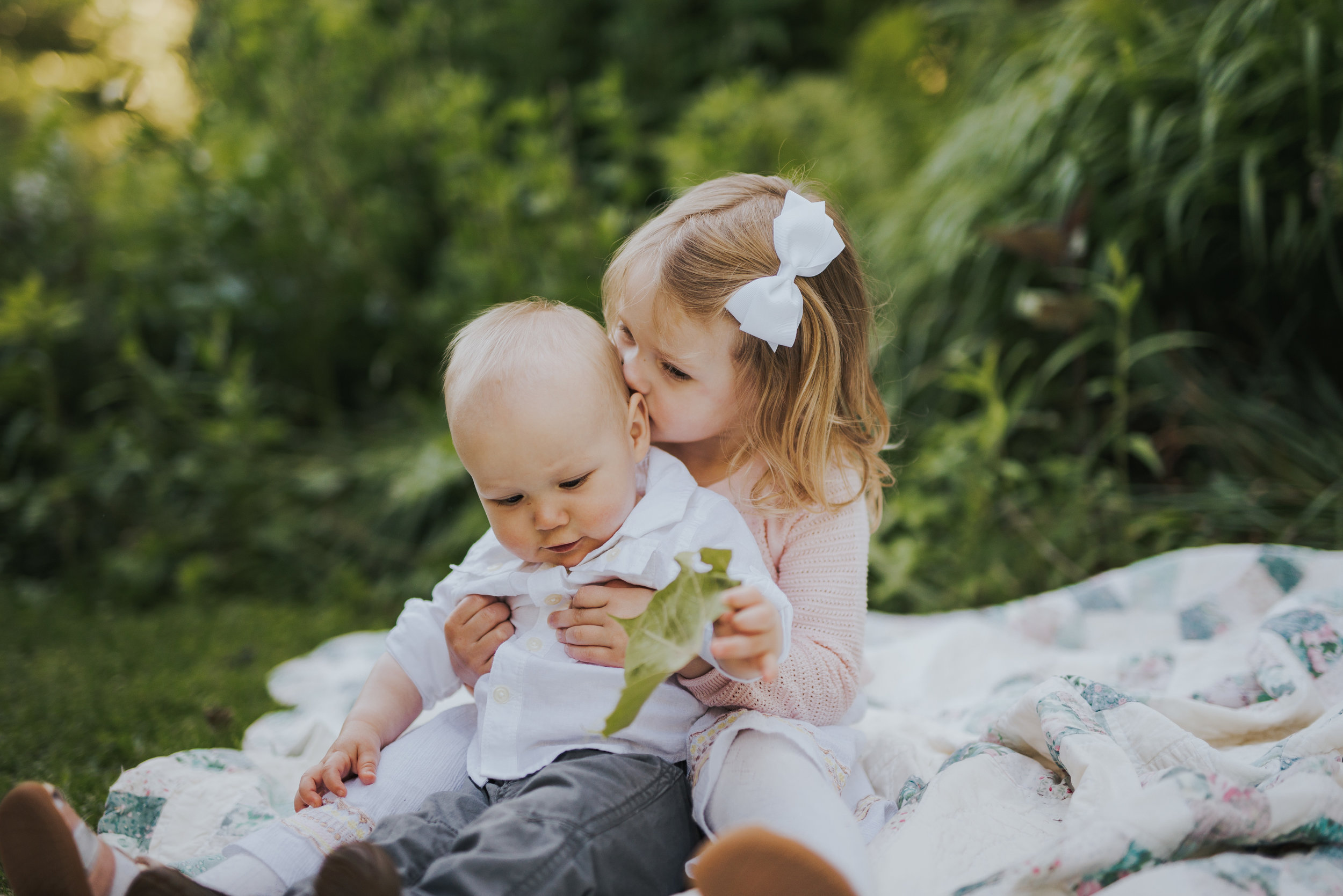 Siblings kissing: Fairfield County Connecticut Lifestyle Family Photography