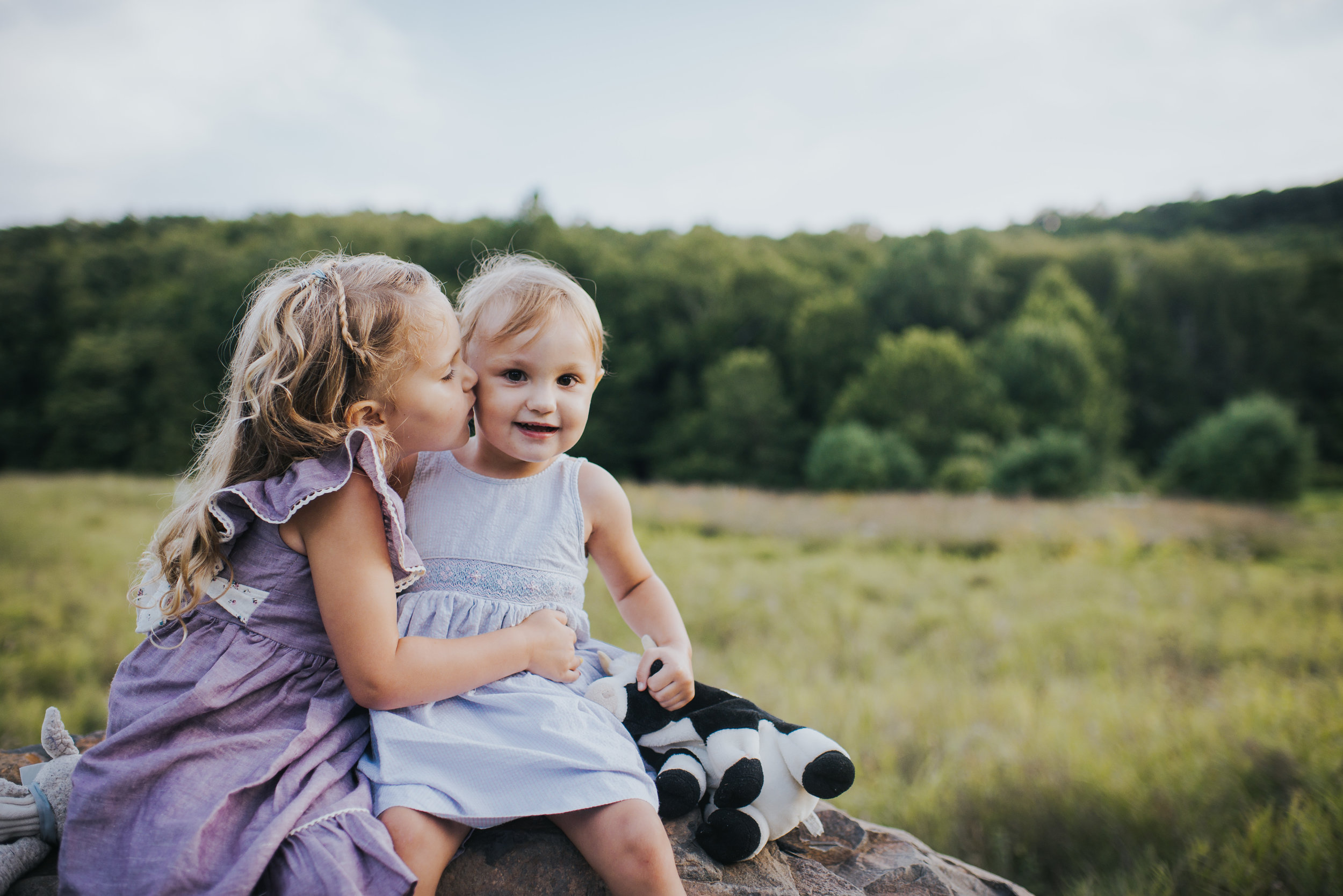 Sisters playing in Southbury, Connecticut Kendra Conroy Photography